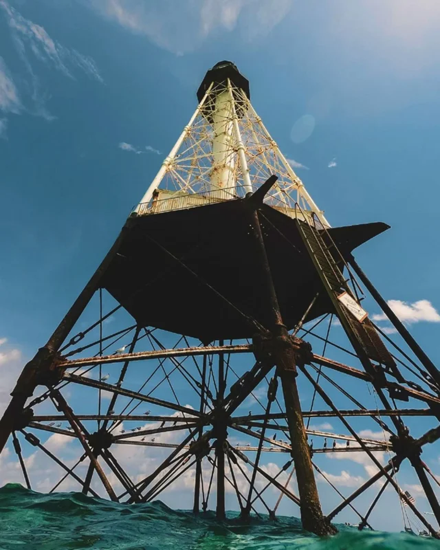 🛥️💙 There is nothing quite like pulling up to the lighthouse and seeing the incredible structure towering above the waves. Rent a boat or charter at the docks and go explore the magic for yourself